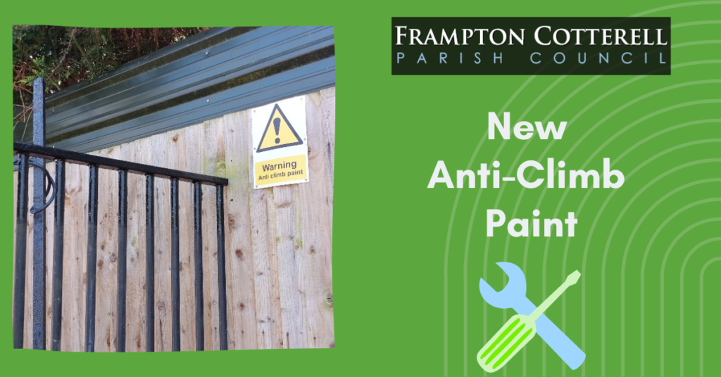 Frampton Cotterell Parish Council. New Anti-Climb Paint. Photograph of a black fence with a "Warning Anti Climb Paint" sign next to it.