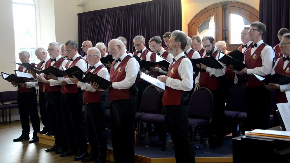 The Frampton Cotterell Male Voice choir, singing.
