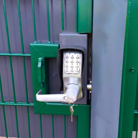 Secure gate with keypad entry at the tennis courts.